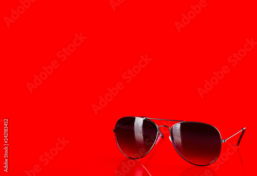 Sunglasses fashion summer accessory on red background