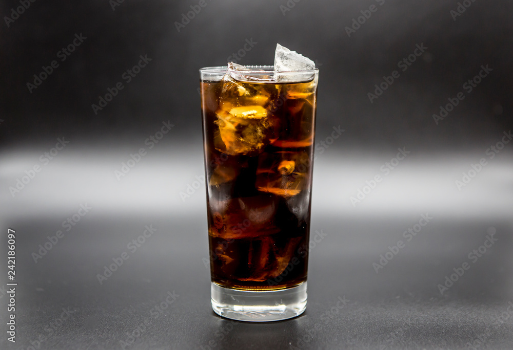 glass of soda and cola glass of soda and cola
