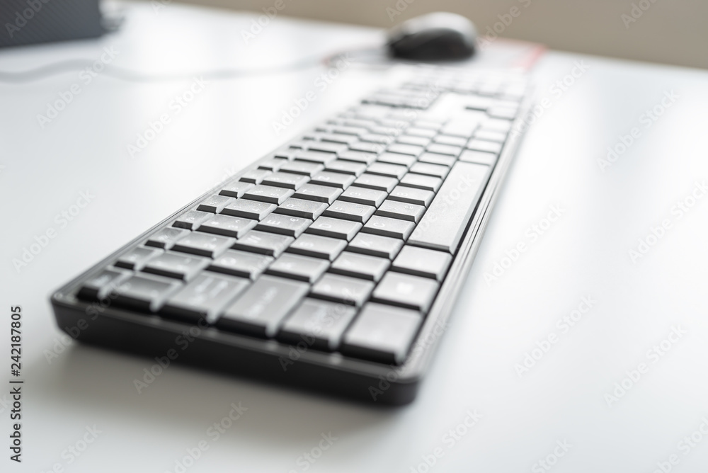 Black computer keyboard and mouse Black computer keyboard and mouse