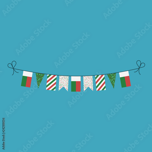 Decorations bunting flags for Madagascar national day holiday in flat design. Independence day or National day holiday concept.