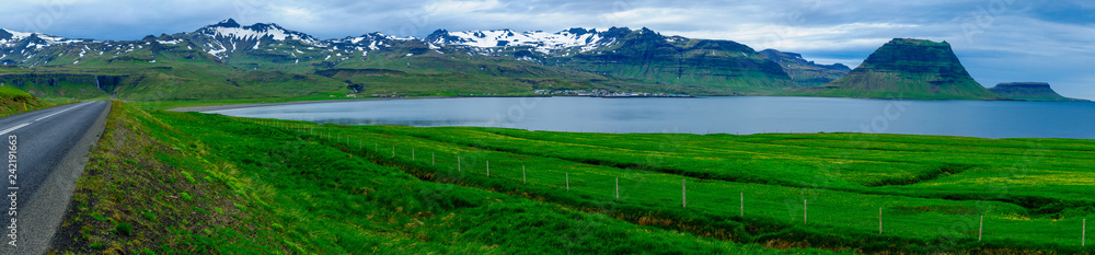 Landscape, the Kirkjufell mountain, and the town Grundarfjordur
