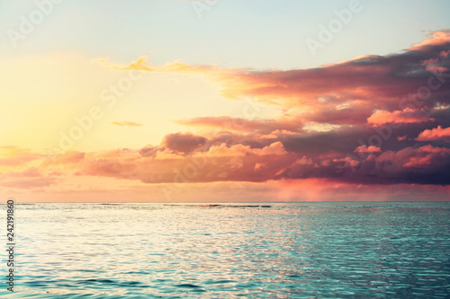 beautiful colorful sea sunset with heavy clouds