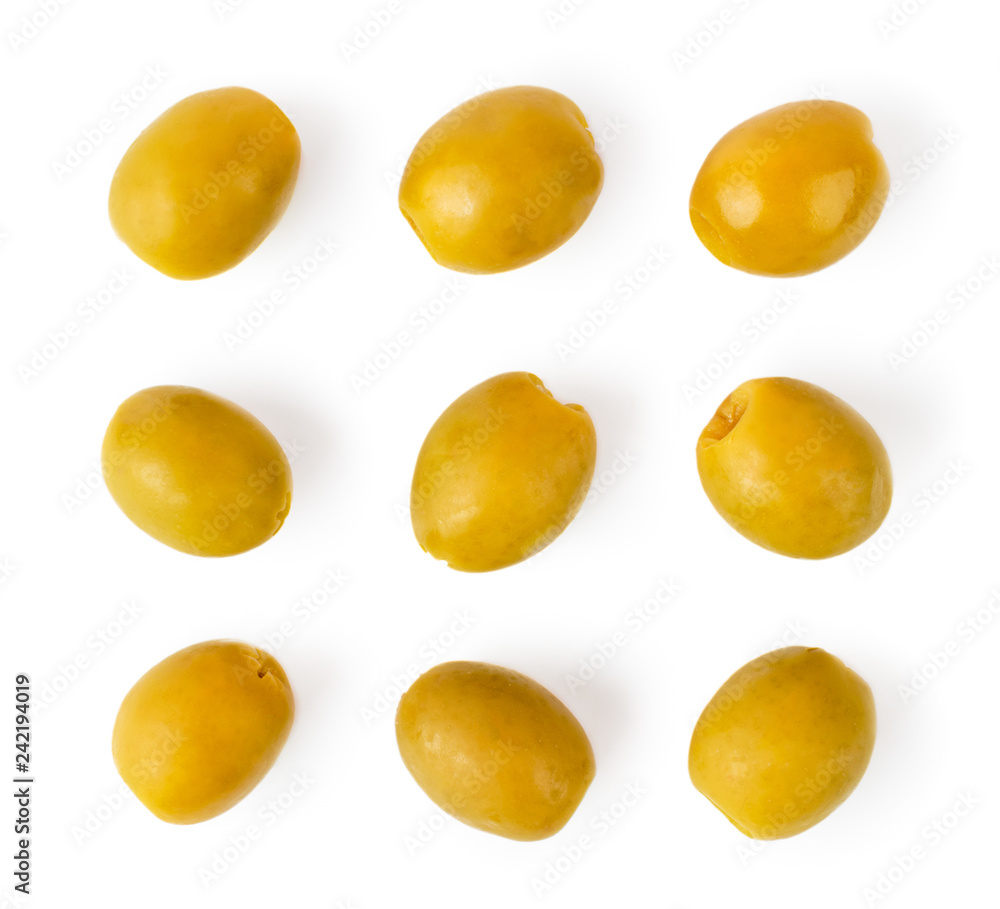 Green olives on a white background. The form of the top. Green olives on a white background. The form of the top.