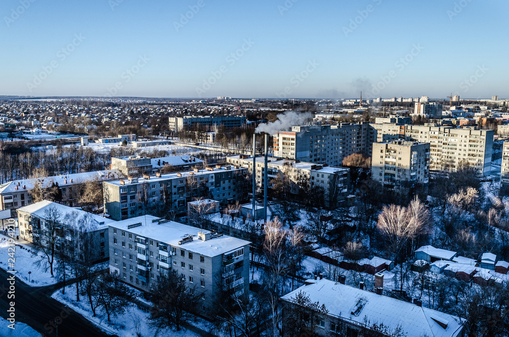 The sleeping area in a small town is heated by a boiler room in winter. Architecture in Russia in the major cities