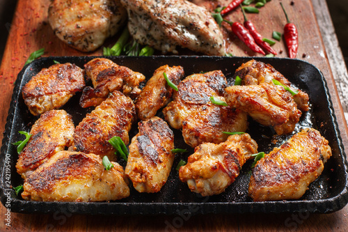 Chicken wings on barbecue grill. Tasty, beautiful and appetizing.