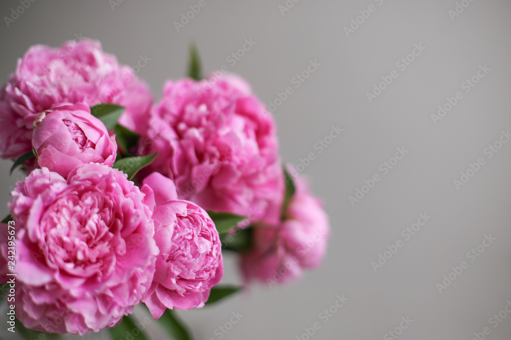 Flowers composition. Pink peony flowers on wooden background. Mothers day. Flat lay, top view. Flowers composition. Pink peony flowers on wooden background. Mothers day. Flat lay, top view.