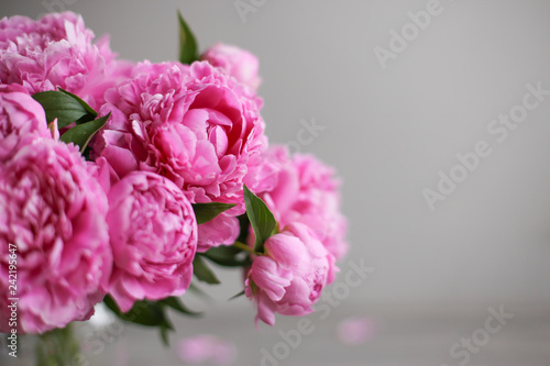 Flowers composition.  Pink peony flowers on wooden background. Mothers day. Flat lay  top view.