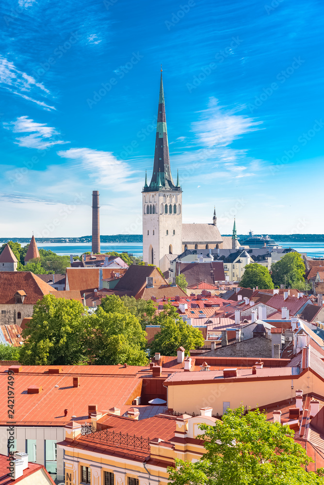 Tallinn in Estonia, panorama of the medieval city with Saint-Nicolas church, colorful houses and typical towers 