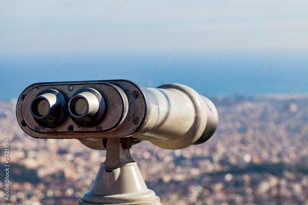Panorama of Barcelona and binoculars - from Tibidabo mountain - beautifu bright sky