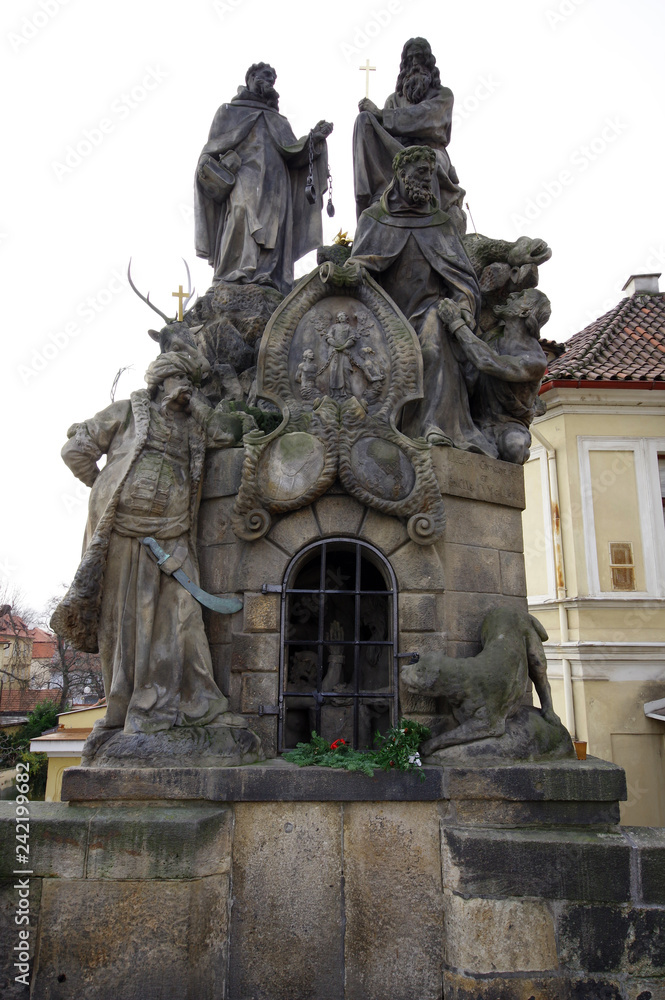 Statues of Saints John of Matha, Felix of Valois, and Ivan on Charles bridge, Prague, Czech Republic