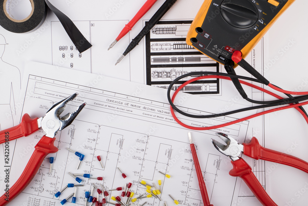 Tools for electrical installations laid on electrical schemes - obrazy, fototapety, plakaty 