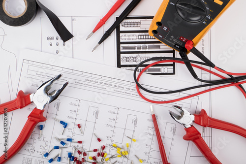 Tools for electrical installations laid on electrical schemes photo