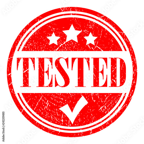 Tested red grunge stamp