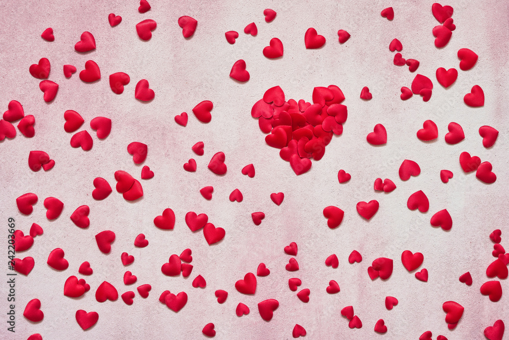 Valentines Day background. Red hearts on pink background. Copy space, top view. Valentines Day background. Red hearts on pink background. Copy space, top view.
