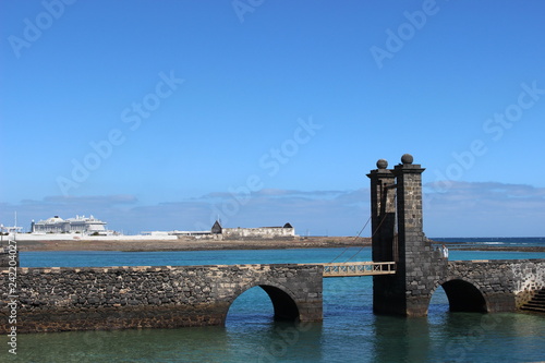 old bridge in front of the sea