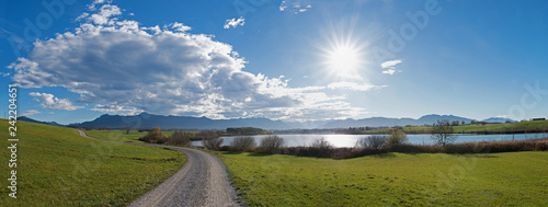 Idyllischer Wanderweg rund um den Riegsee, Blick ins Blaue Land und die Alpen photo