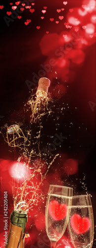 Photography Sparkling wine squirts out of the bottle, hearts in the glasses, Valentine's Day