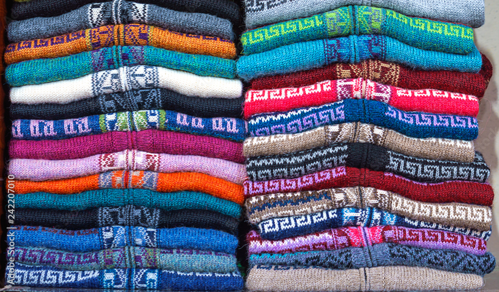 Peruvian traditional colourful native handicraft textile fabric at market in Peru, South Americain. Close up. selective focus