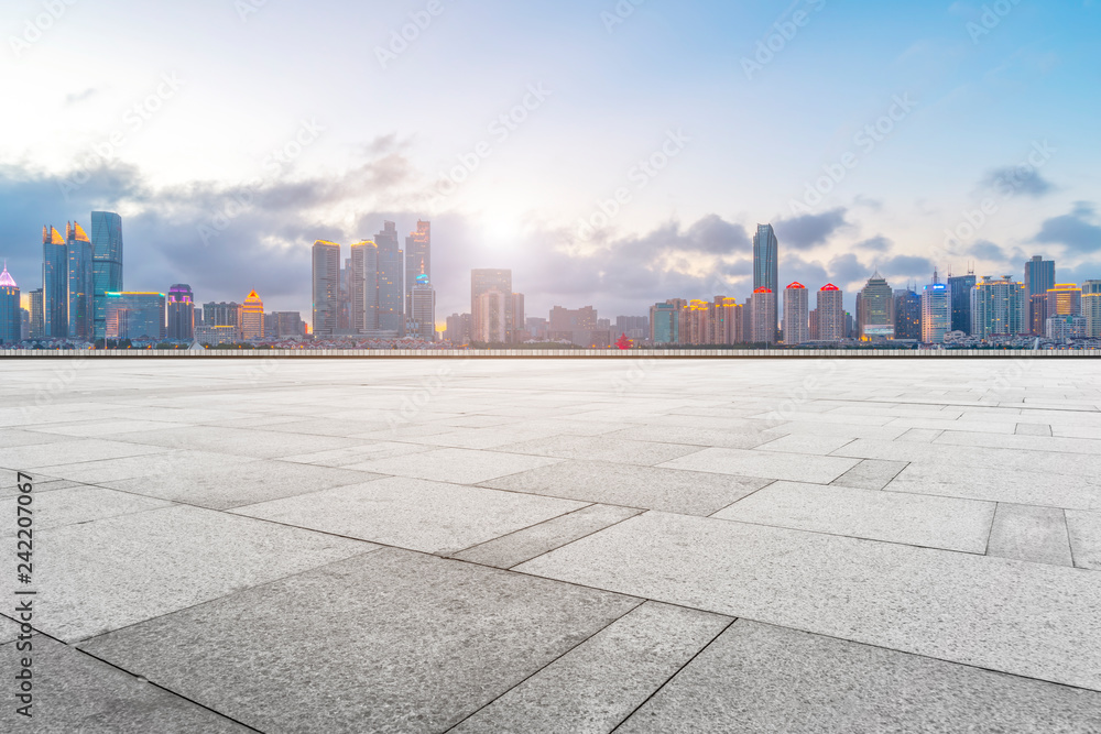 Urban skyscrapers with empty square floor tiles