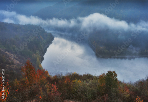 fog over the canyon of the picturesque river. autumn morning in national park