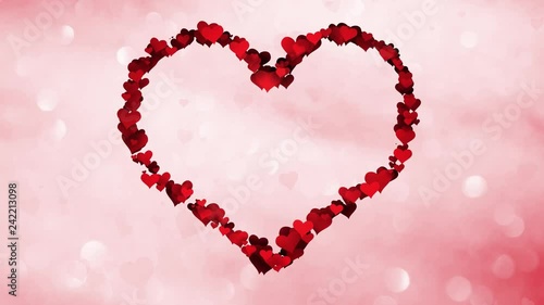 Artistic red heart shapes in the shape of a big Valenitines day heart on bokeh background.  photo