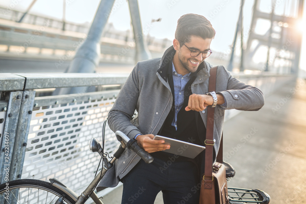 Fototapeta premium Young business man going to work.