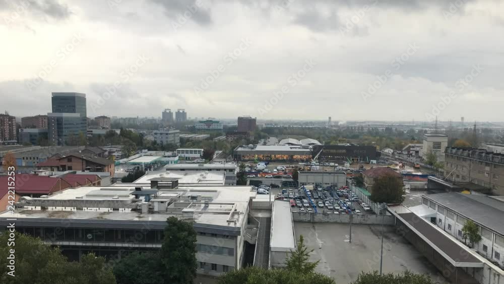 Cinemagraph - Urban view to industrial area of the city. Car parking in Turin. Barriera, Torino.