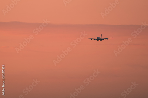 aircraft landing at sunrise