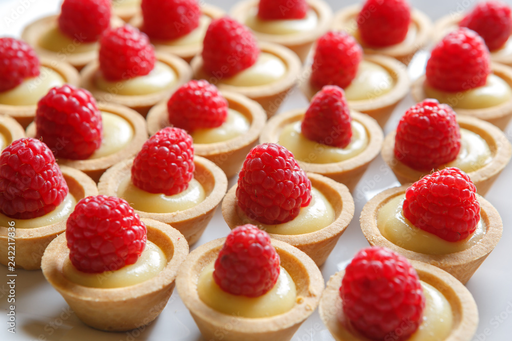 Raspberry cupcake desserts with cream Raspberry cupcake desserts with cream