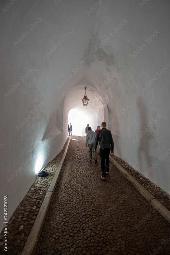 Pedestrians Walking through Tunnel at Pena Palace in Sintra