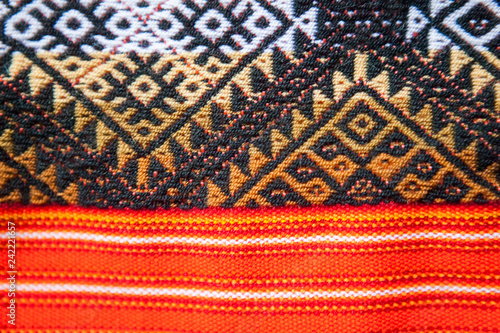 Wooven Wool multicolor andean textile, traditional Fabric Background colourful Texture. Cusco - Perú photo