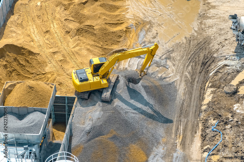 Aerial view of site preparation and construction in progress.