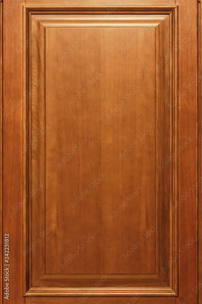 Front view of parts of the beautiful wooden door close up