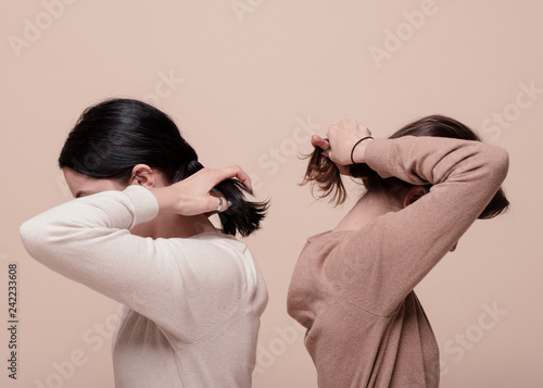 two girls in tan