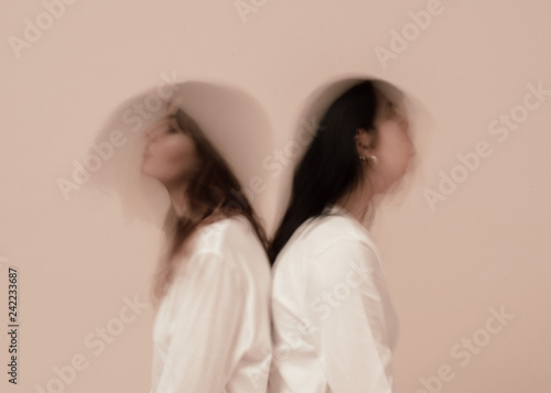 two girls in tan