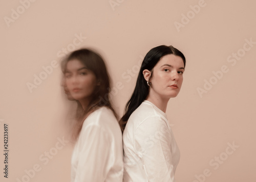 two girls in tan