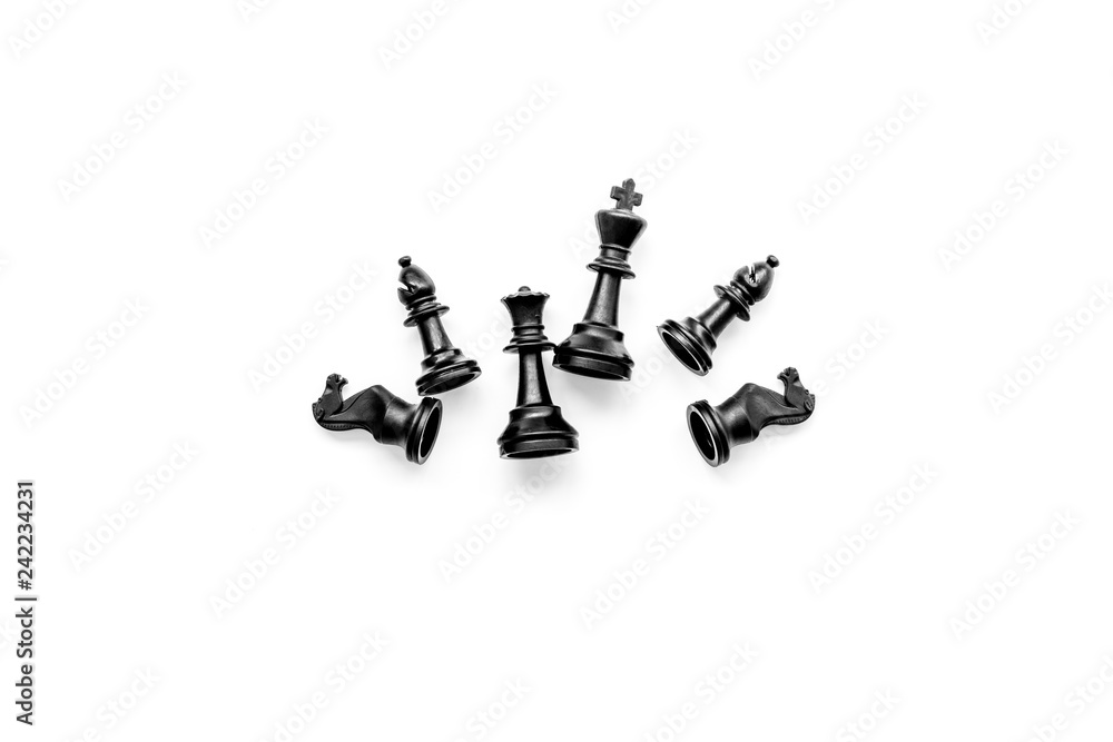 Competition or victory or strategy concept. Chess figures on white background top view pattern copy space Competition or victory or strategy concept. Chess figures on white background top view pattern copy space