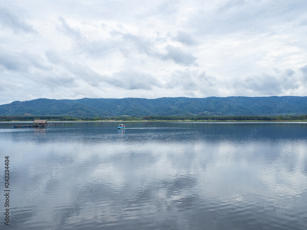 Scenic view landscape of lake and mountains in Northern Thailand.