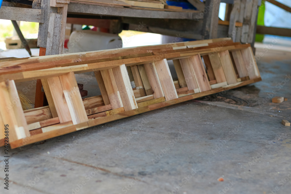 Carpenters are using tools with wood working furniture. Carpenters are using tools with wood working furniture.