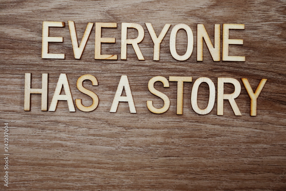 every on has a story text message on wooden background every on has a story text message on wooden background