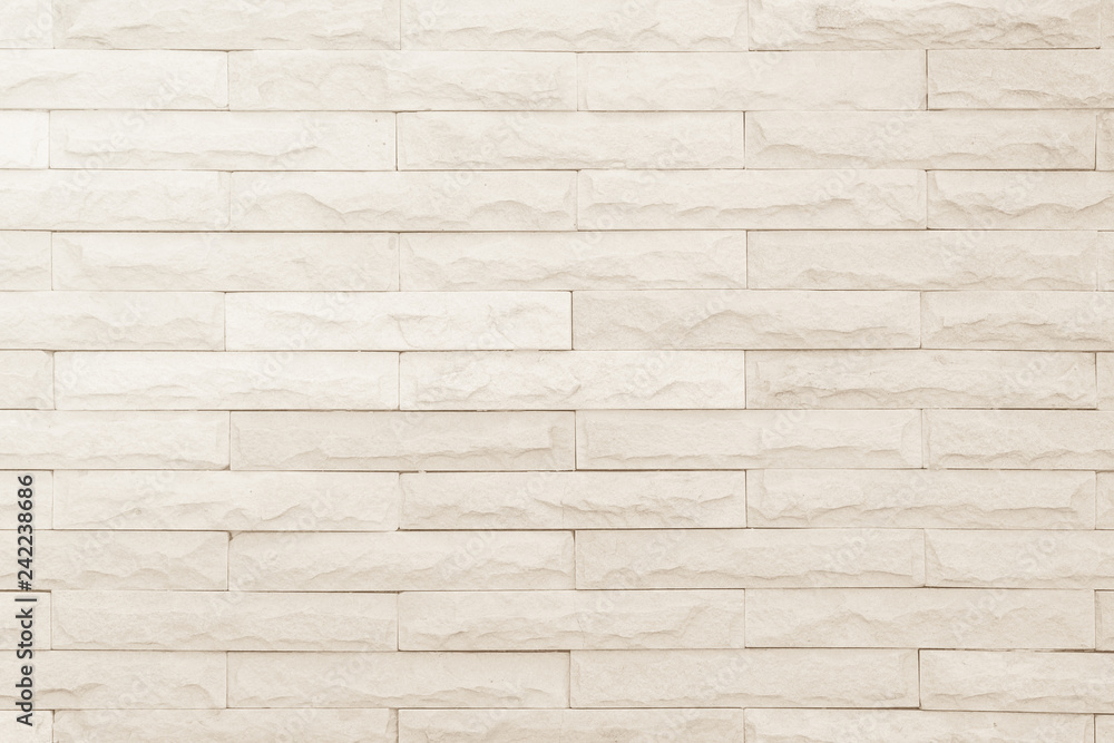 Seamless Cream pattern of decorative brick sandstone wall surface with concrete of modern style design decorative uneven have cracked realmasonry wall of multicolored stones or blocks white cement. Seamless Cream pattern of decorative brick sandstone wall surface with concrete of modern style design decorative uneven have cracked realmasonry wall of multicolored stones or blocks white cement.