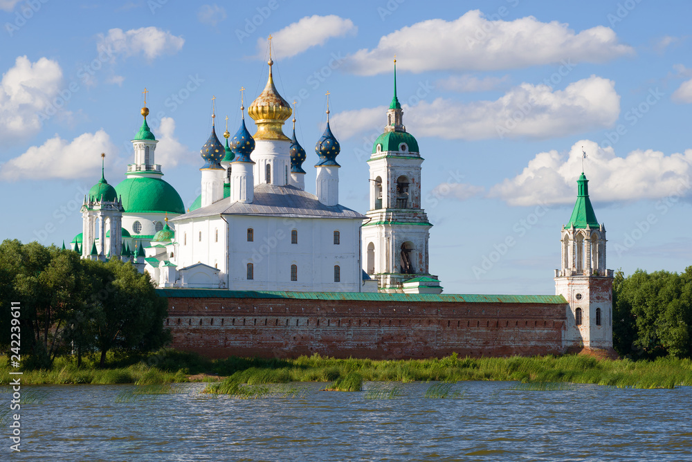 Domes of the Spaso-Yakovlevsky Dmitrovsky Monastery on a sunny July day. Rostov the Great, Golden Ring of Russia Domes of the Spaso-Yakovlevsky Dmitrovsky Monastery on a sunny July day. Rostov the Great, Golden Ring of Russia