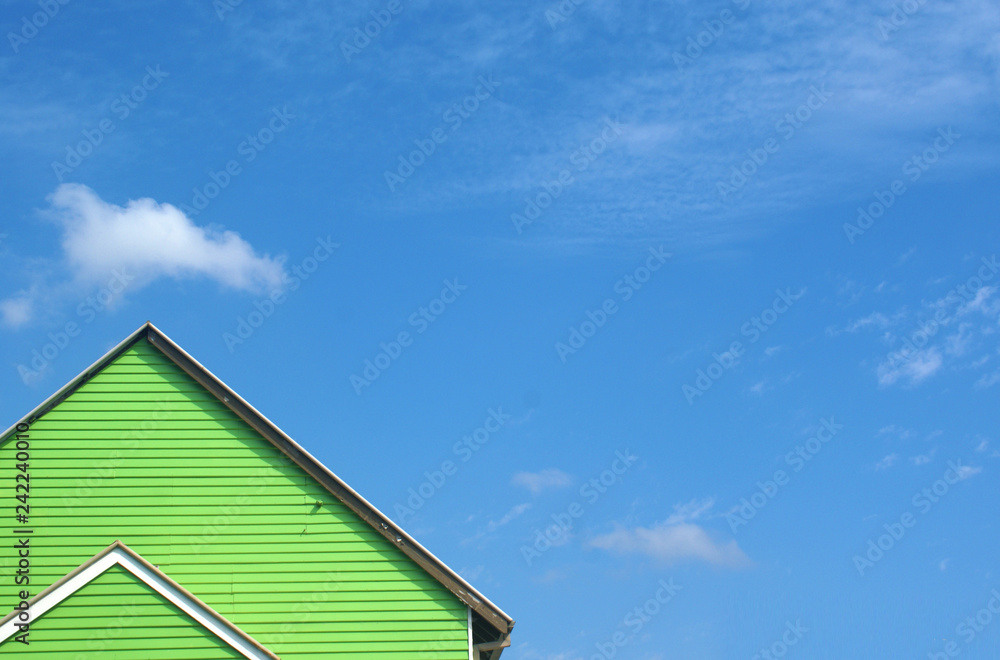 green house rooftop with blue sky green house rooftop with blue sky
