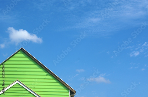 green house rooftop with blue sky