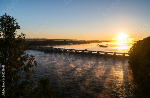 Overlooking the Illinois River on a beautiful fall/autumn morning as the sun slowly rises.  Starved Rock State Park, Illinois, USA. photo