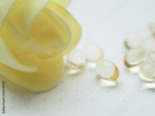 pills with yellow rose