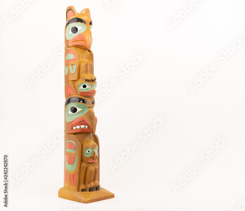 totem pole isolated on white background facing right