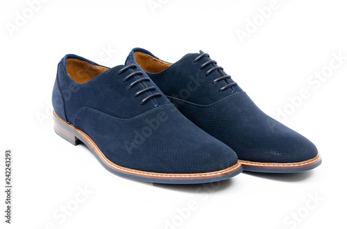Blue suede shoes isolated on white background