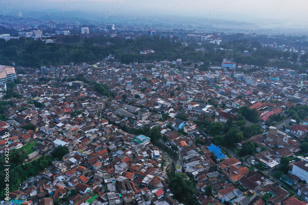 Crowded houses at misty morning in Bandung