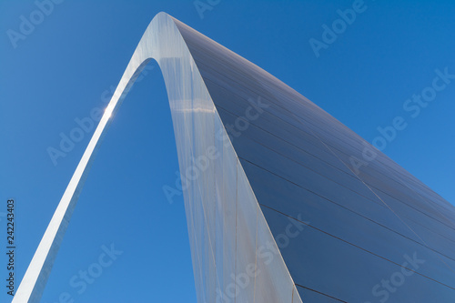 Abstract view of the Gateway Arch with brilliant blue skies in background.  St. Louis, Missouri, USA 
